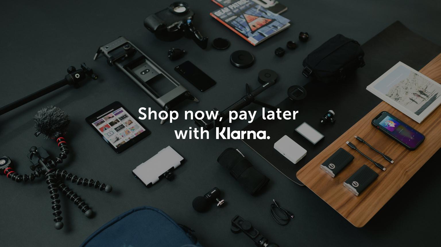 Flat lay of various gear for creatives with text, "Shop now, pay later with Klarna" on top.
