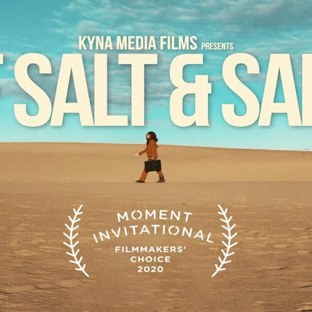 Cover art for Of Salt Salt film woman in brown clothing walking in a desert with a teal sky and text overlay