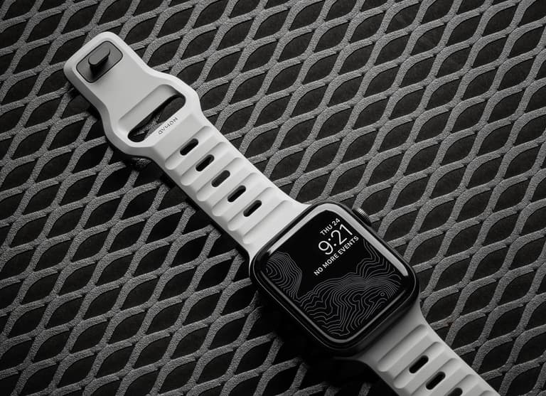 Moment nomad Slim Sport Strap for Apple Watch Lunar Gray on an artistic background