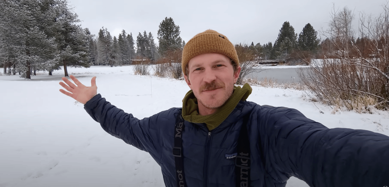 Caleb Babcock selfie with winter scenery