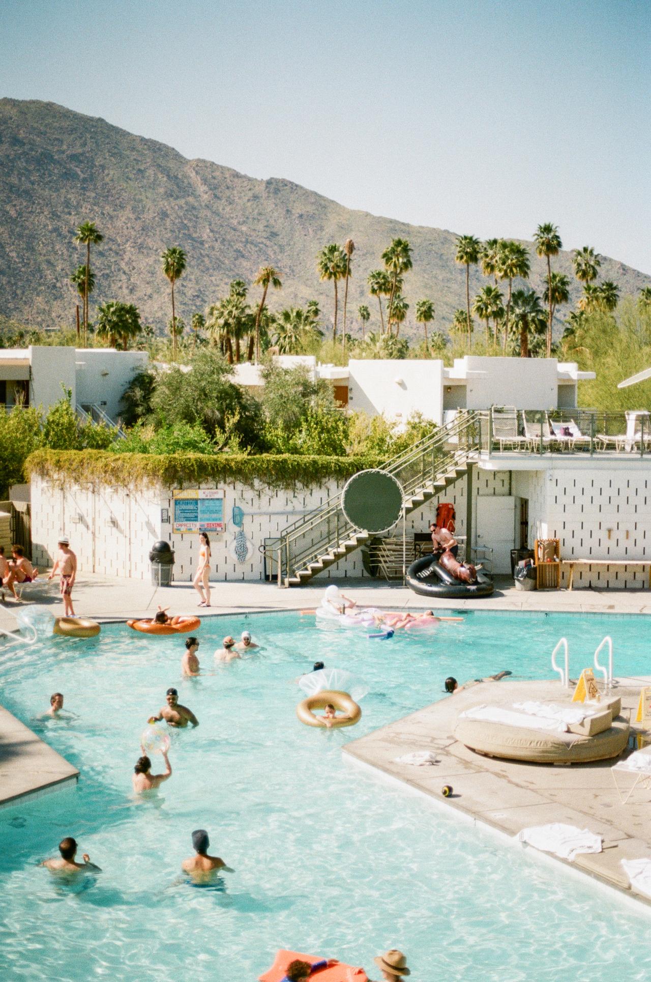 Film Photo of Pool and Palm Trees by Megan Hand