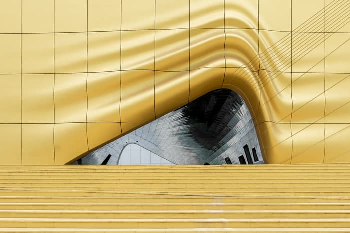 The curving yellow walls of the Paradise Hotel in Incheon, South Korea
