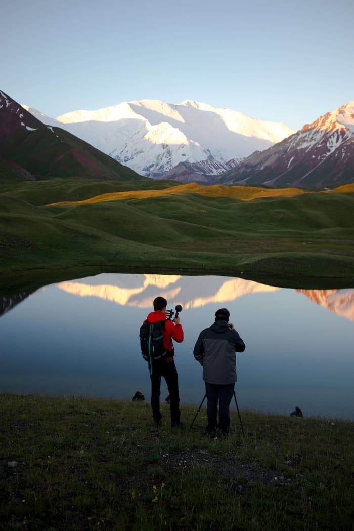 Tristan Bogaard gives photography instruction during sunrise at Tulparkul in Kyrgyzstan