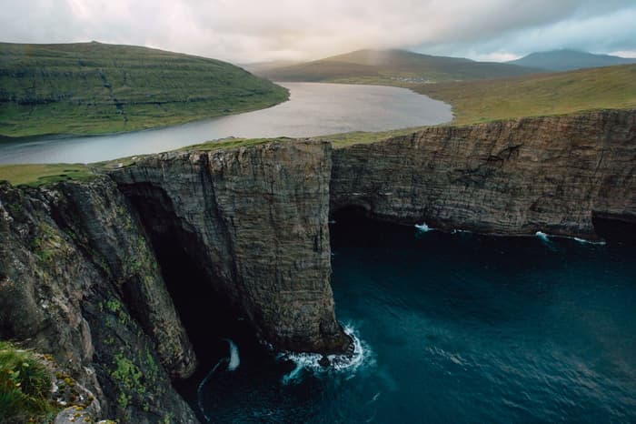 The iconic Sørvágsvatn lake sits right above the ocean, causing an optical illusion to viewers in the Faroe Islands